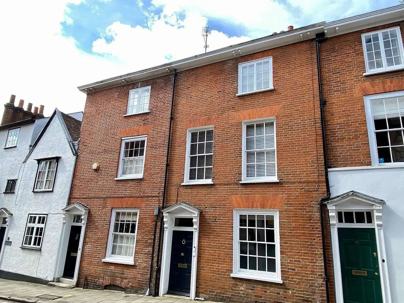 A Georgian brick townhouse on Tilehouse Street, Hitchin, with its original sash windows